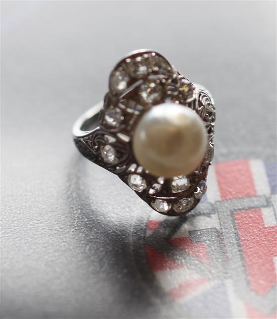 Platinum stamped natural pearl & diamond ring